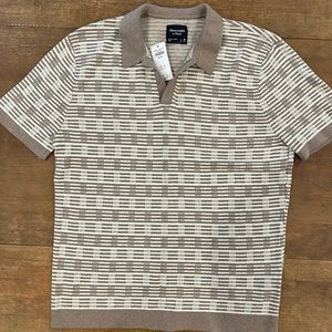 Never worn. Patterned, knit shirt. Slightly oversized.